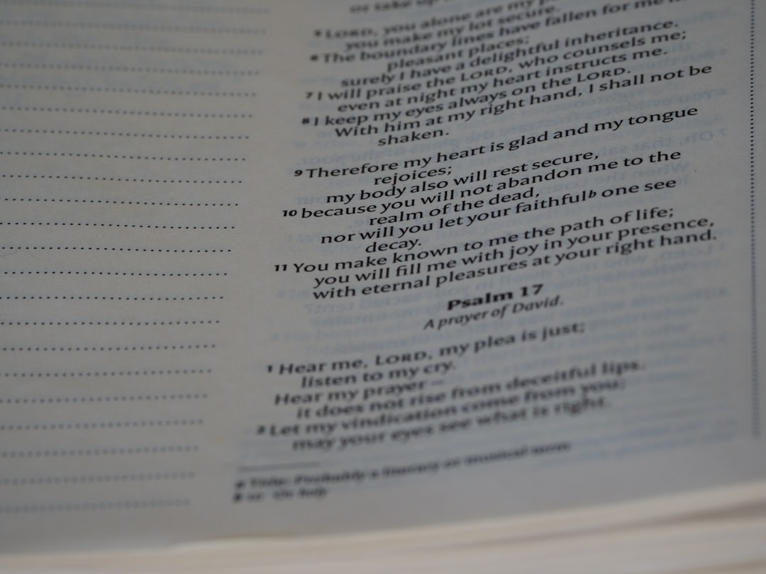 a close up of a book with a poem on it